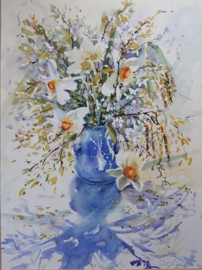 April flowers in a blue pot